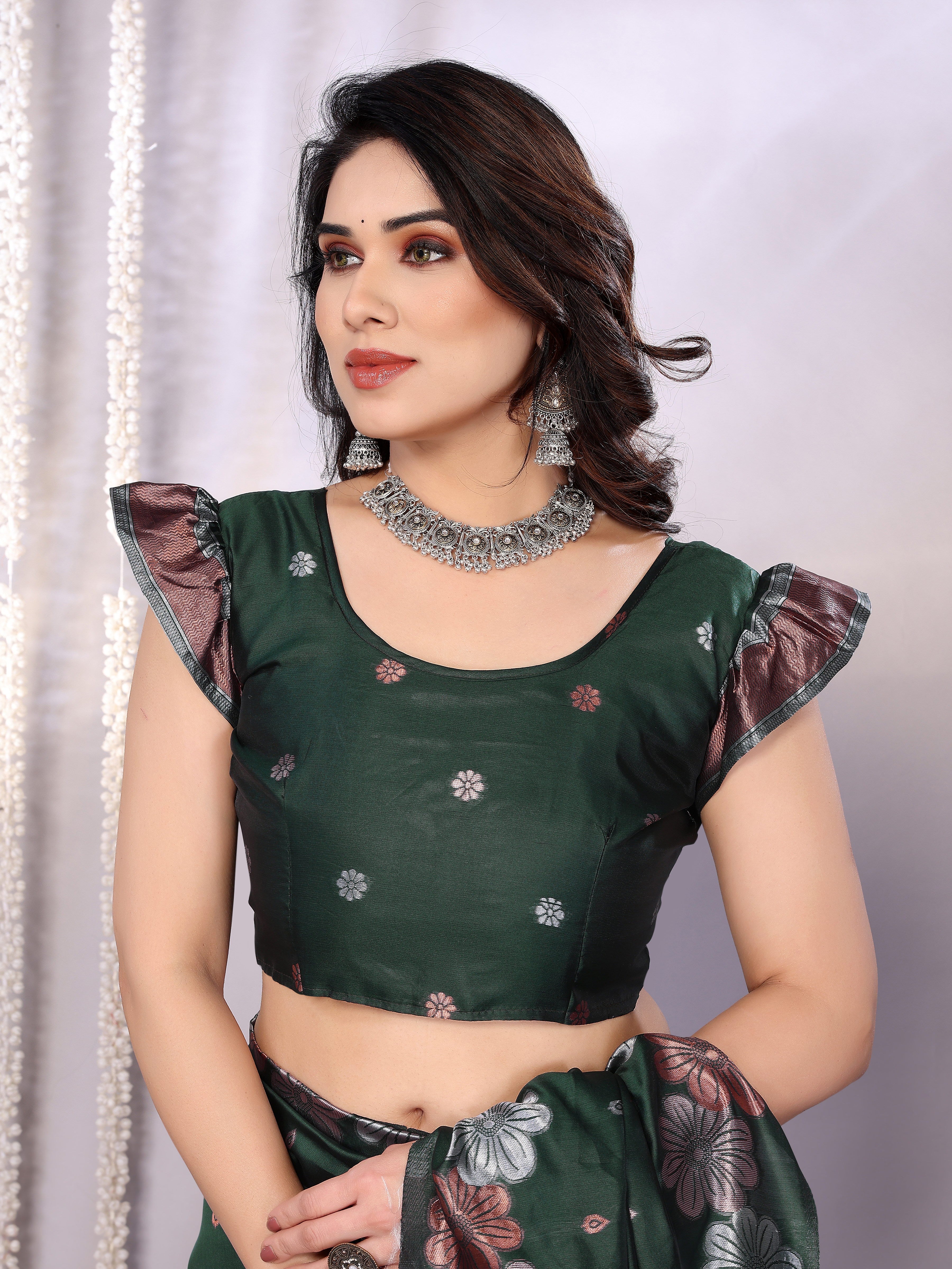 Graceful Bottle Green Floral Woven Saree