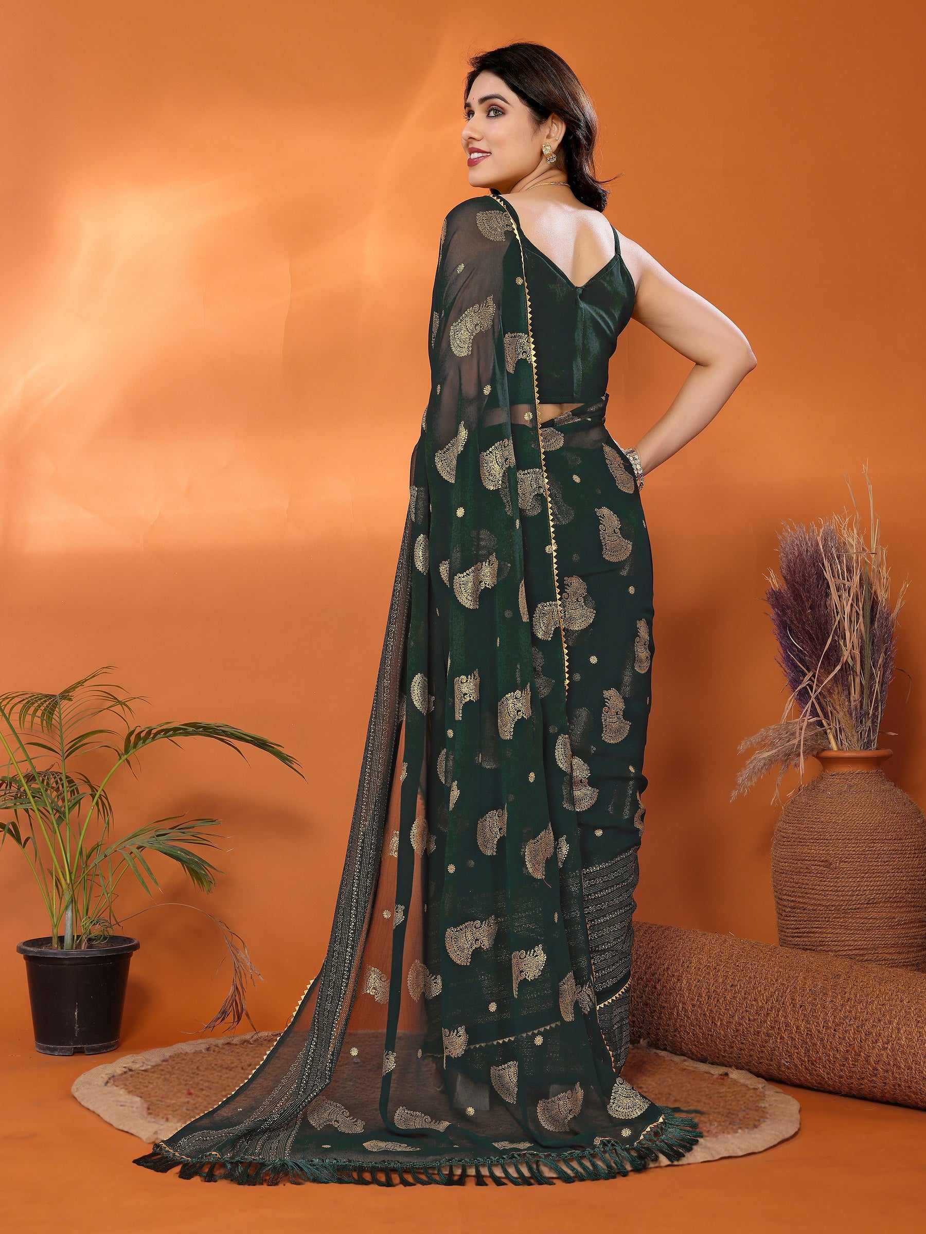 Elegant Dark Green Georgette Saree with Golden Paisley Work