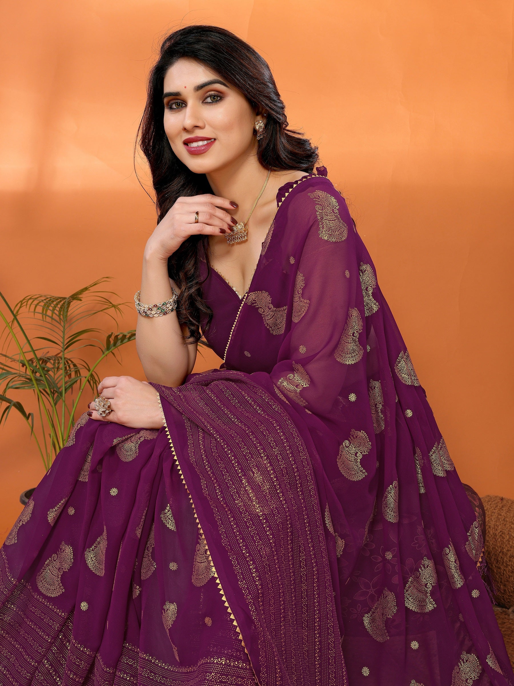 Wine Purple Georgette Saree with Golden Zari Detailing