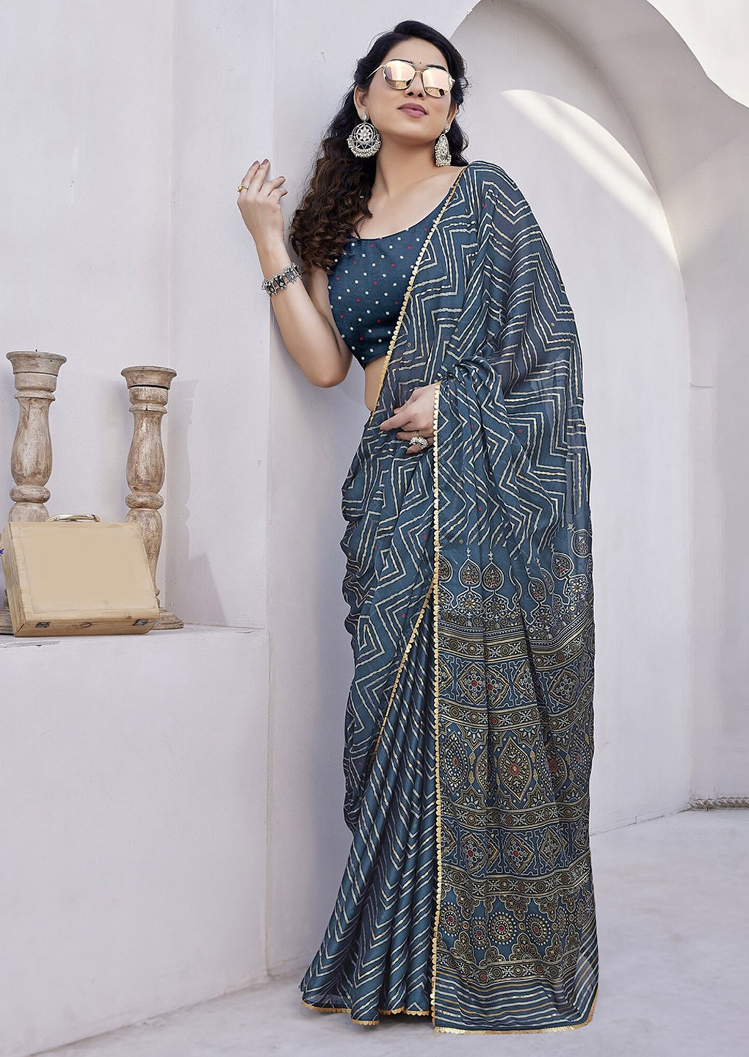 Teal Blue Printed Saree with Ethnic Border and Pallu