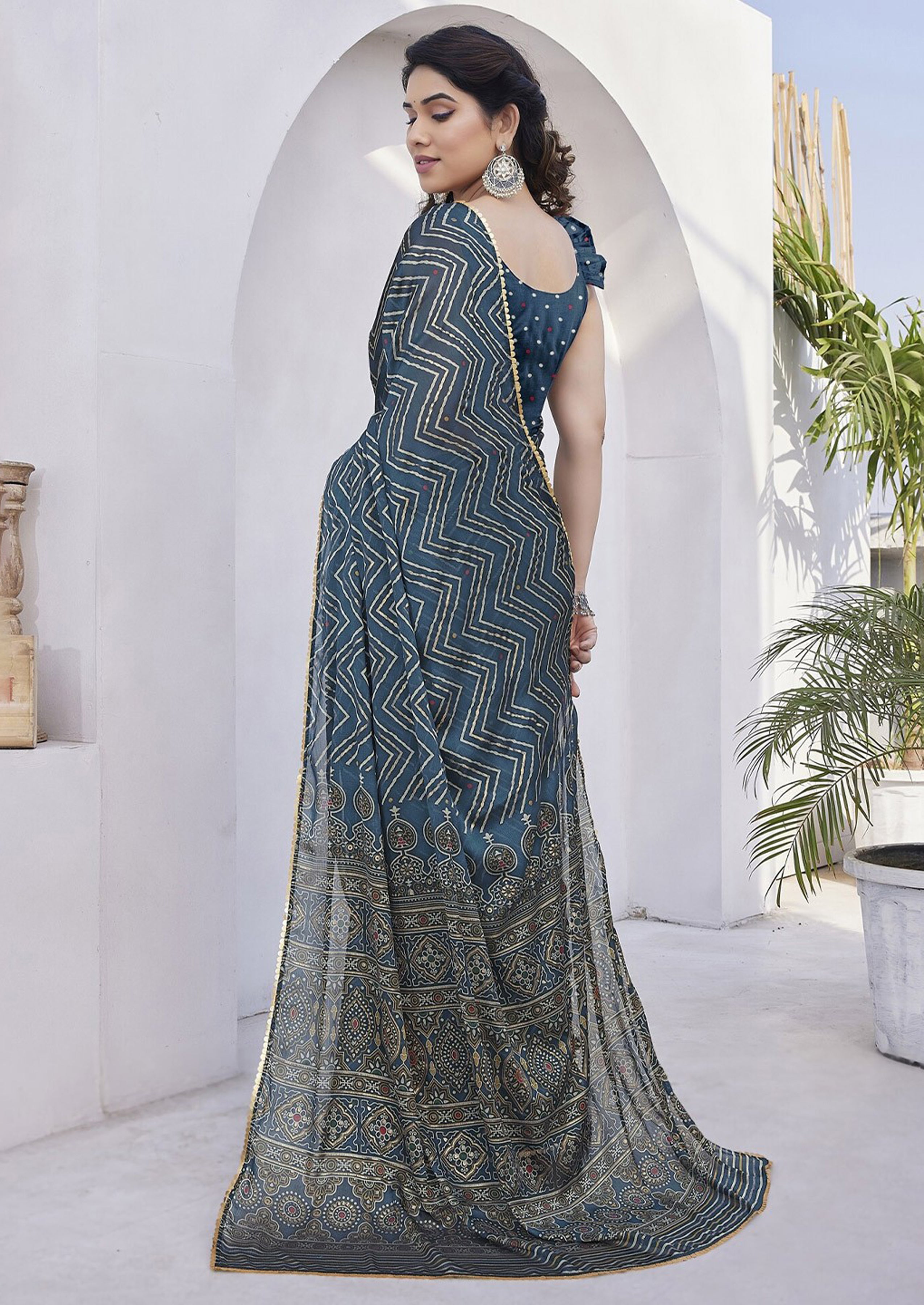 Teal Blue Printed Saree with Ethnic Border and Pallu
