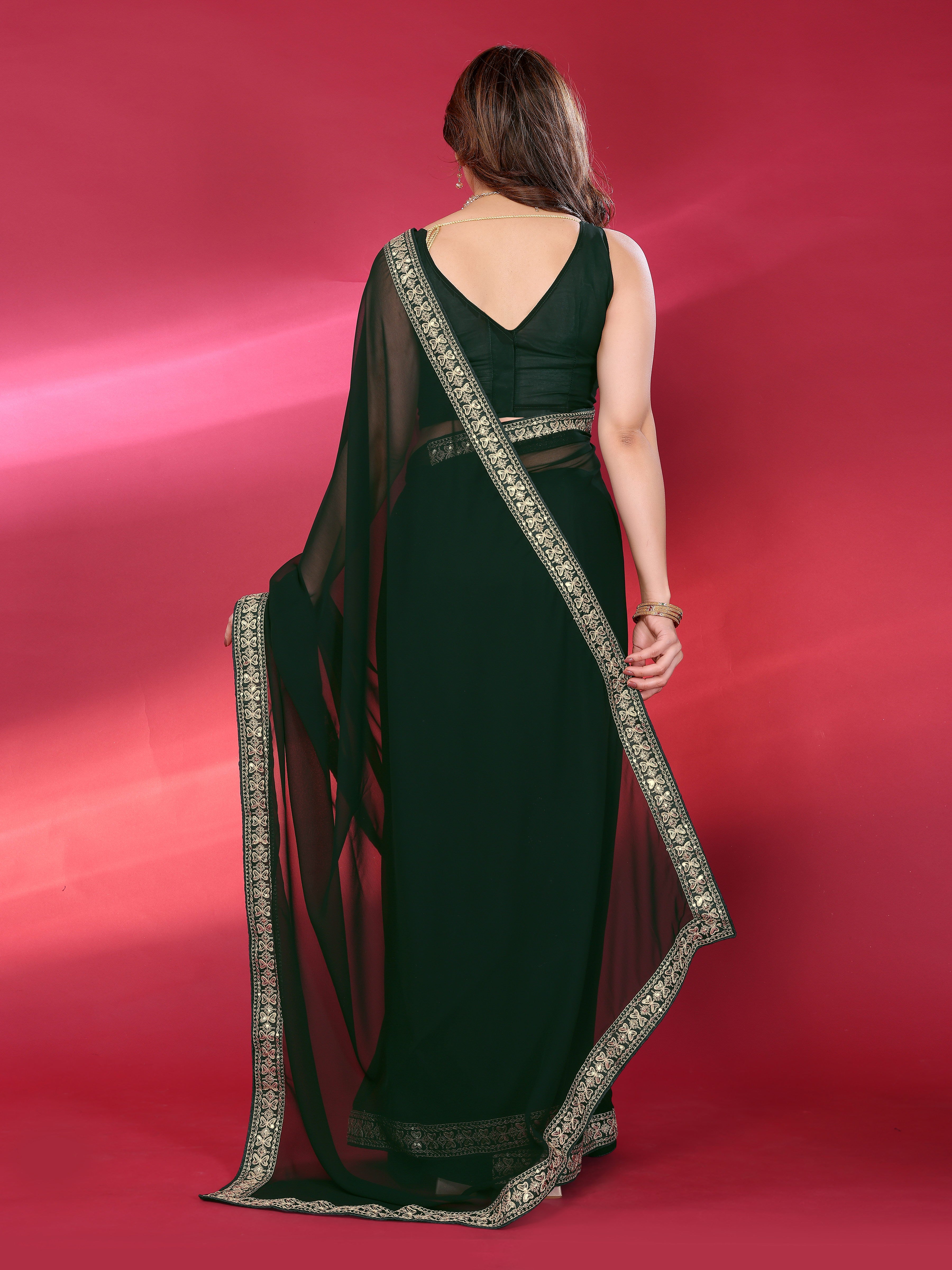 Dark Green Georgette Saree with Golden Embroidered Border
