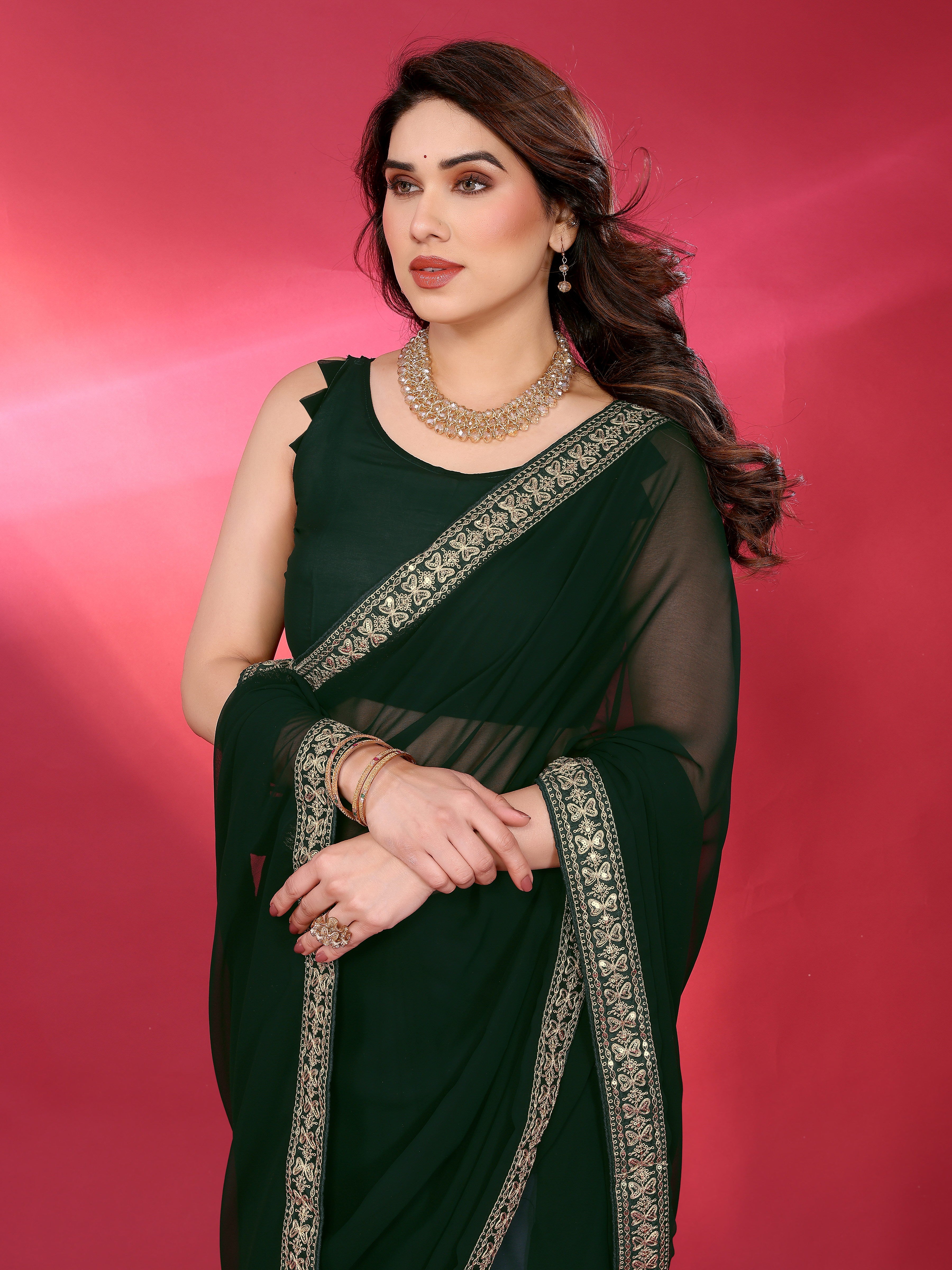 Dark Green Georgette Saree with Golden Embroidered Border
