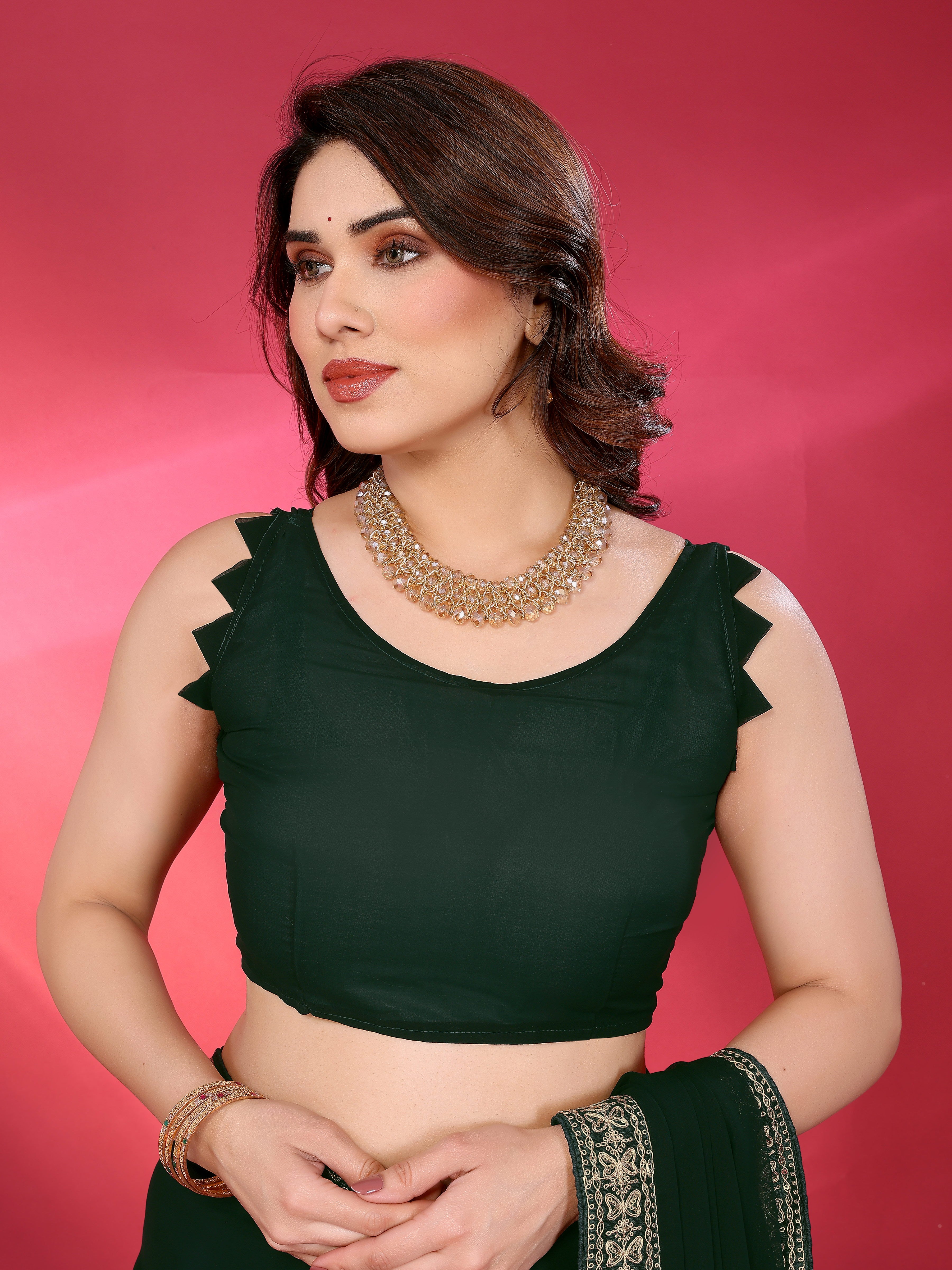 Dark Green Georgette Saree with Golden Embroidered Border