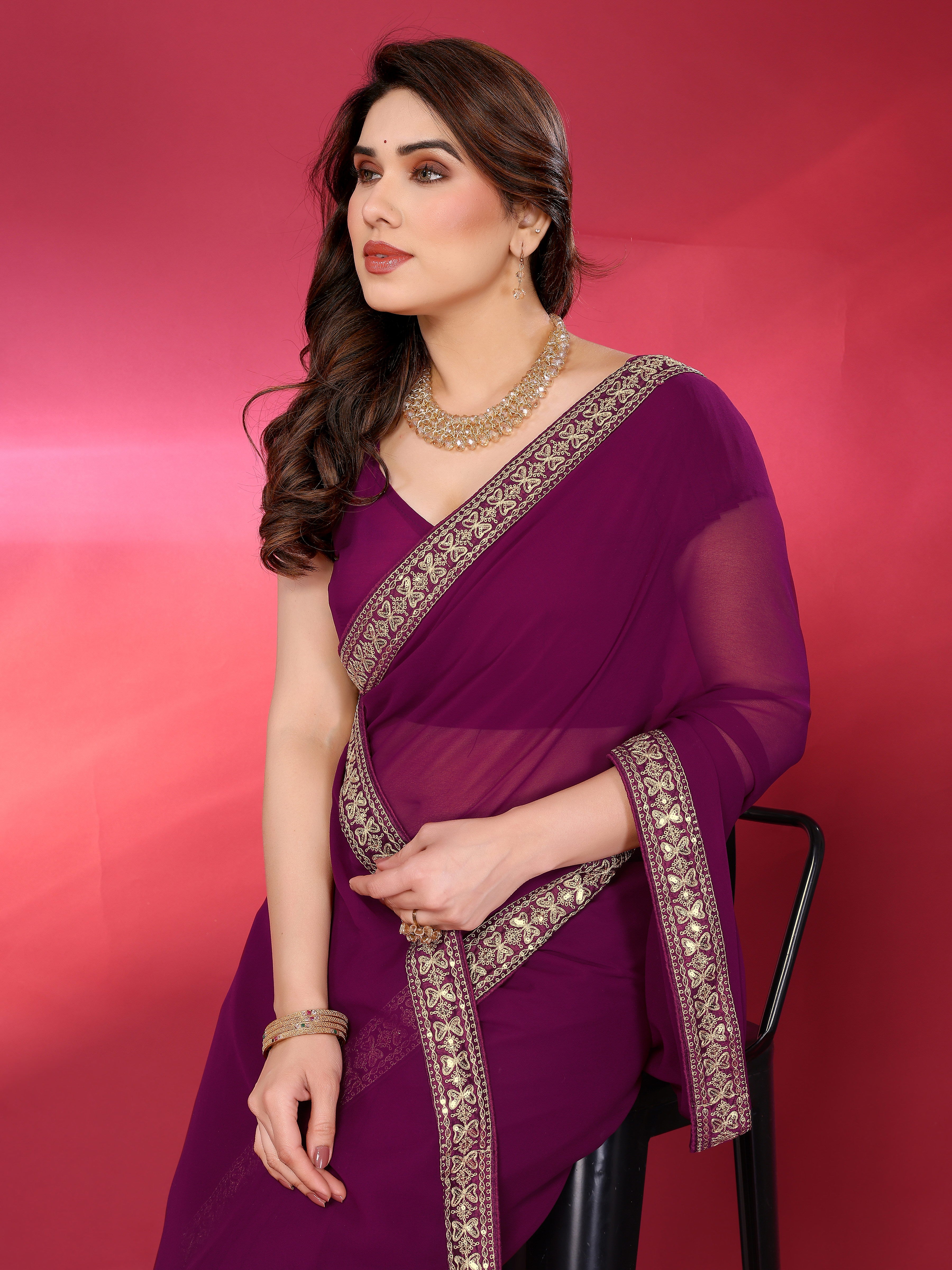 Elegant  Georgette Saree with Golden Embroidered Border