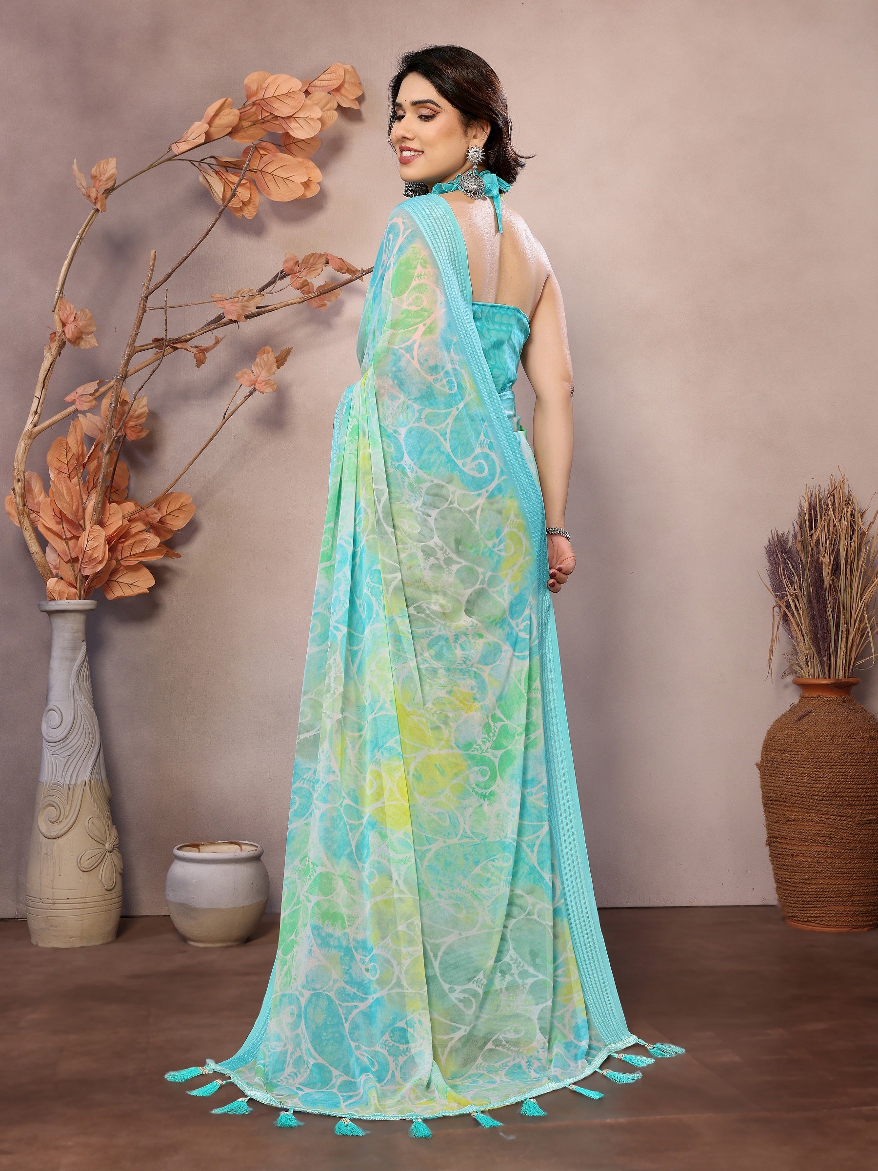 Soothing Aqua Green Floral Georgette Saree