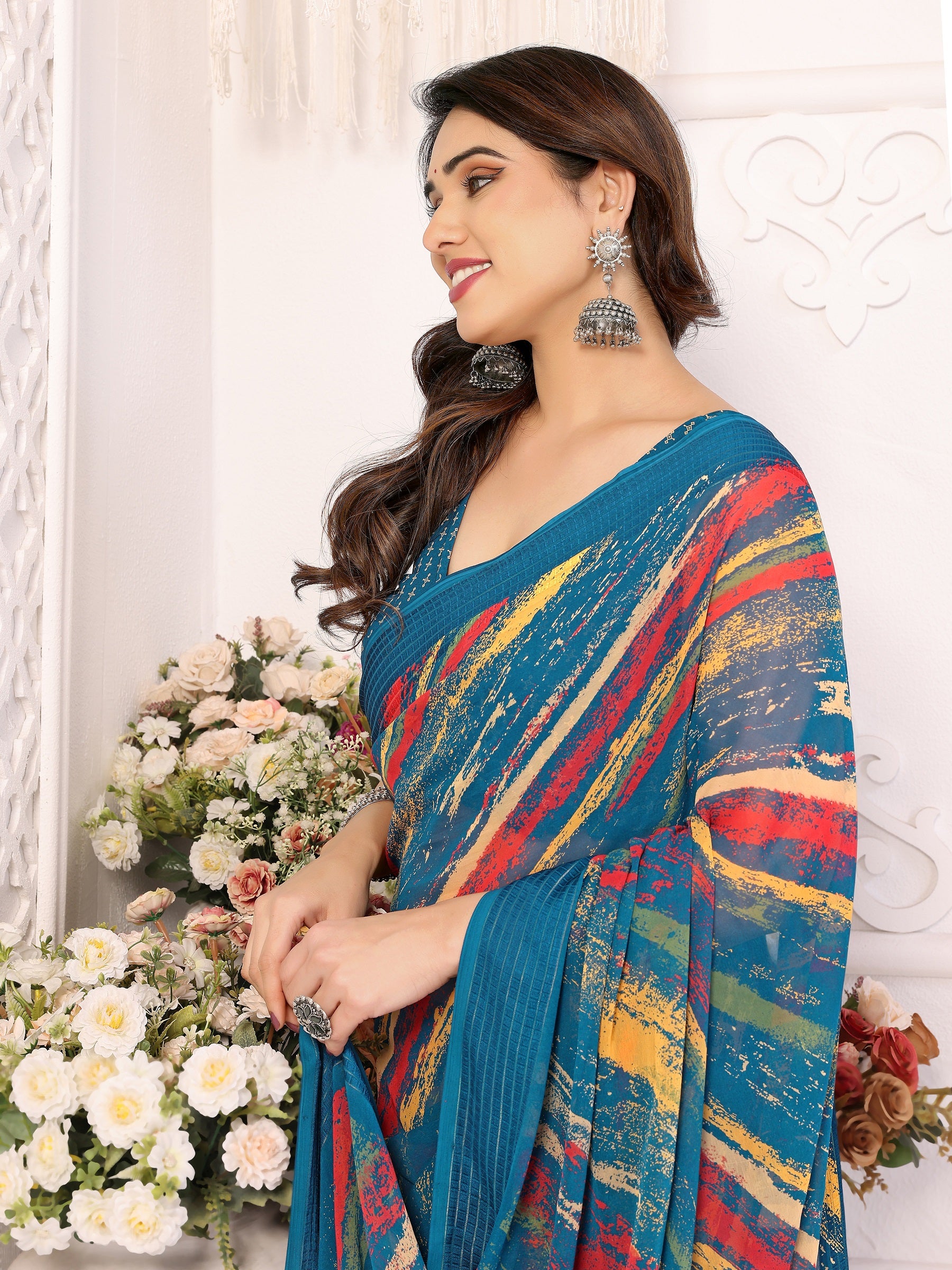 Vibrant Teal Multicolor Printed Georgette Saree