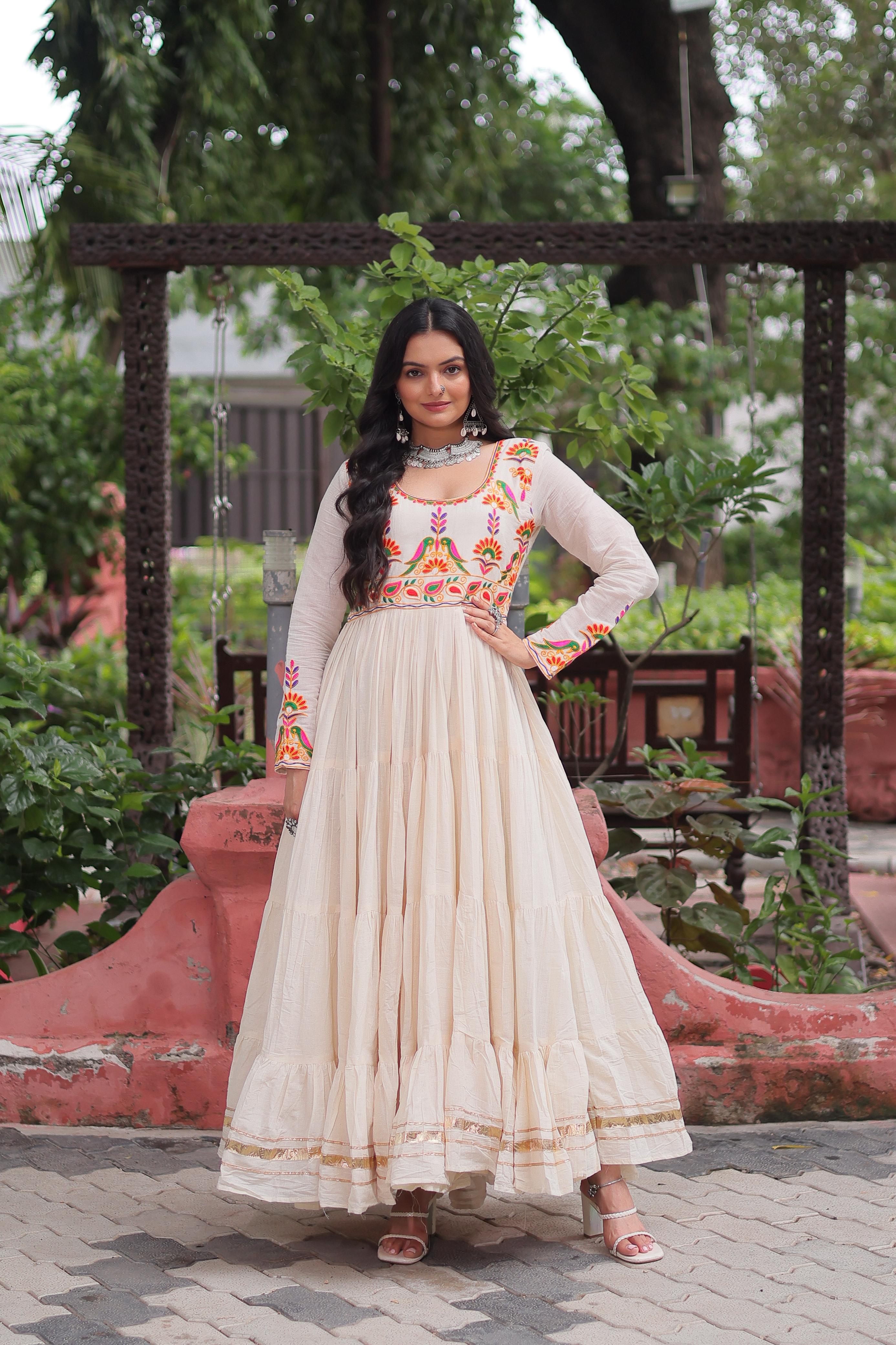 Cream Tiered Anarkali Gown with Vibrant Mirror Embroidery