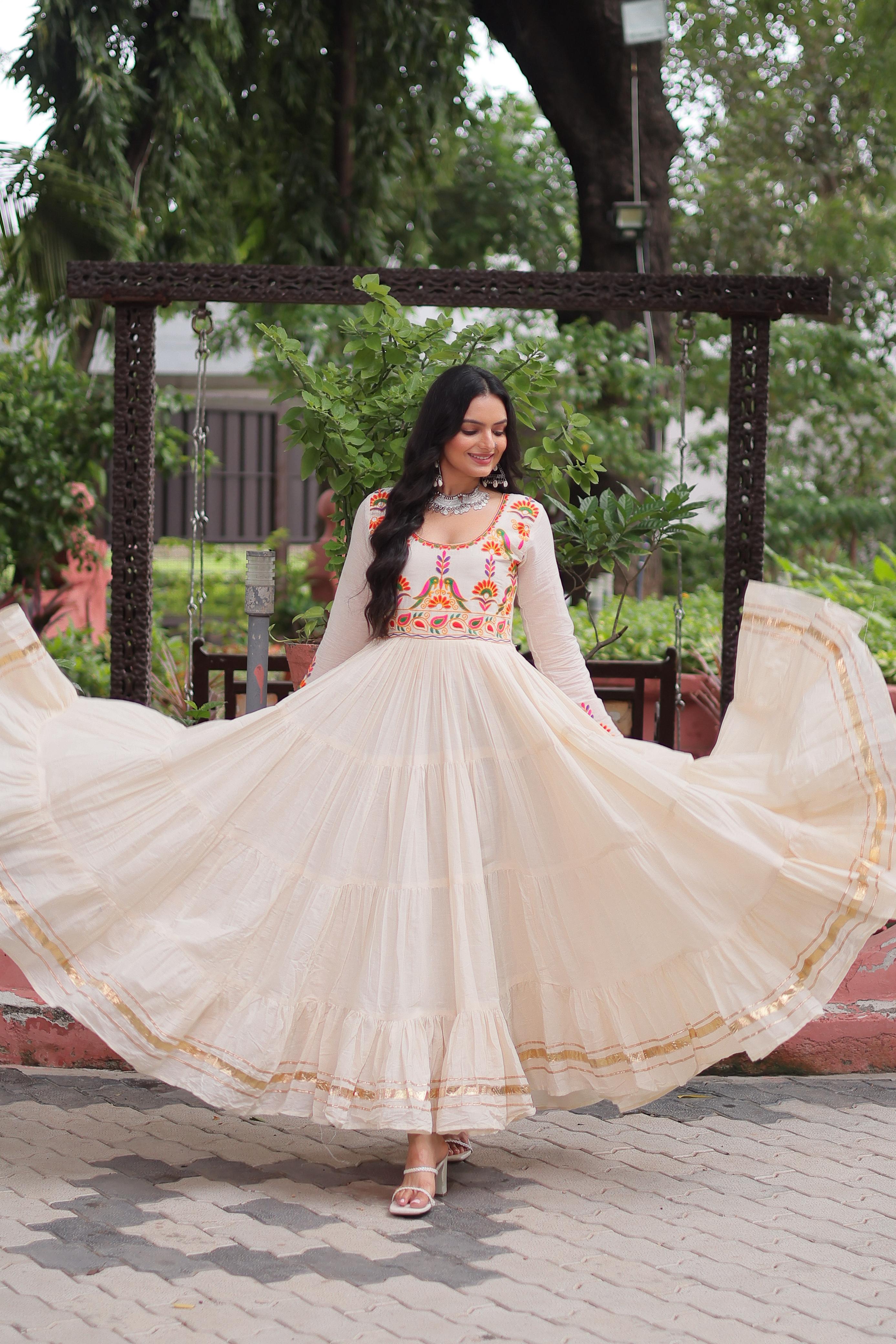 Cream Tiered Anarkali Gown with Vibrant Mirror Embroidery