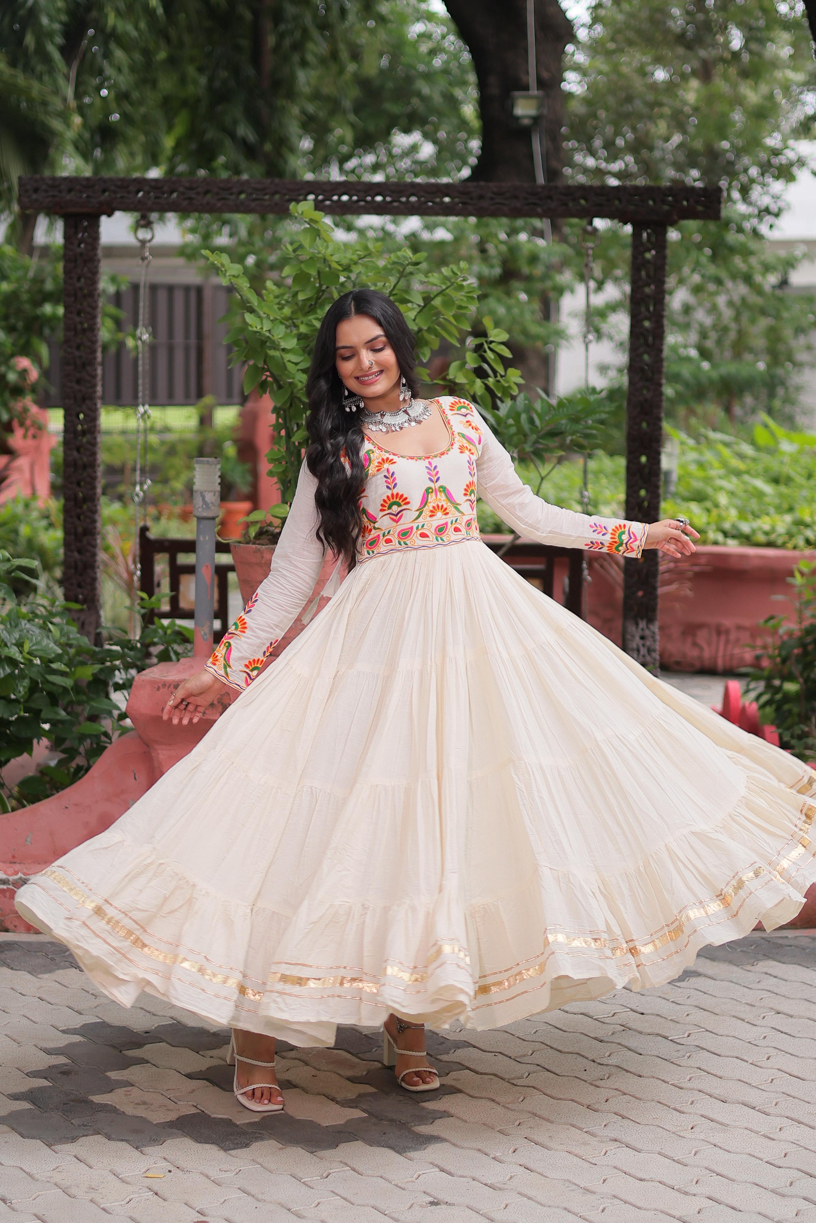 Cream Tiered Anarkali Gown with Vibrant Mirror Embroidery