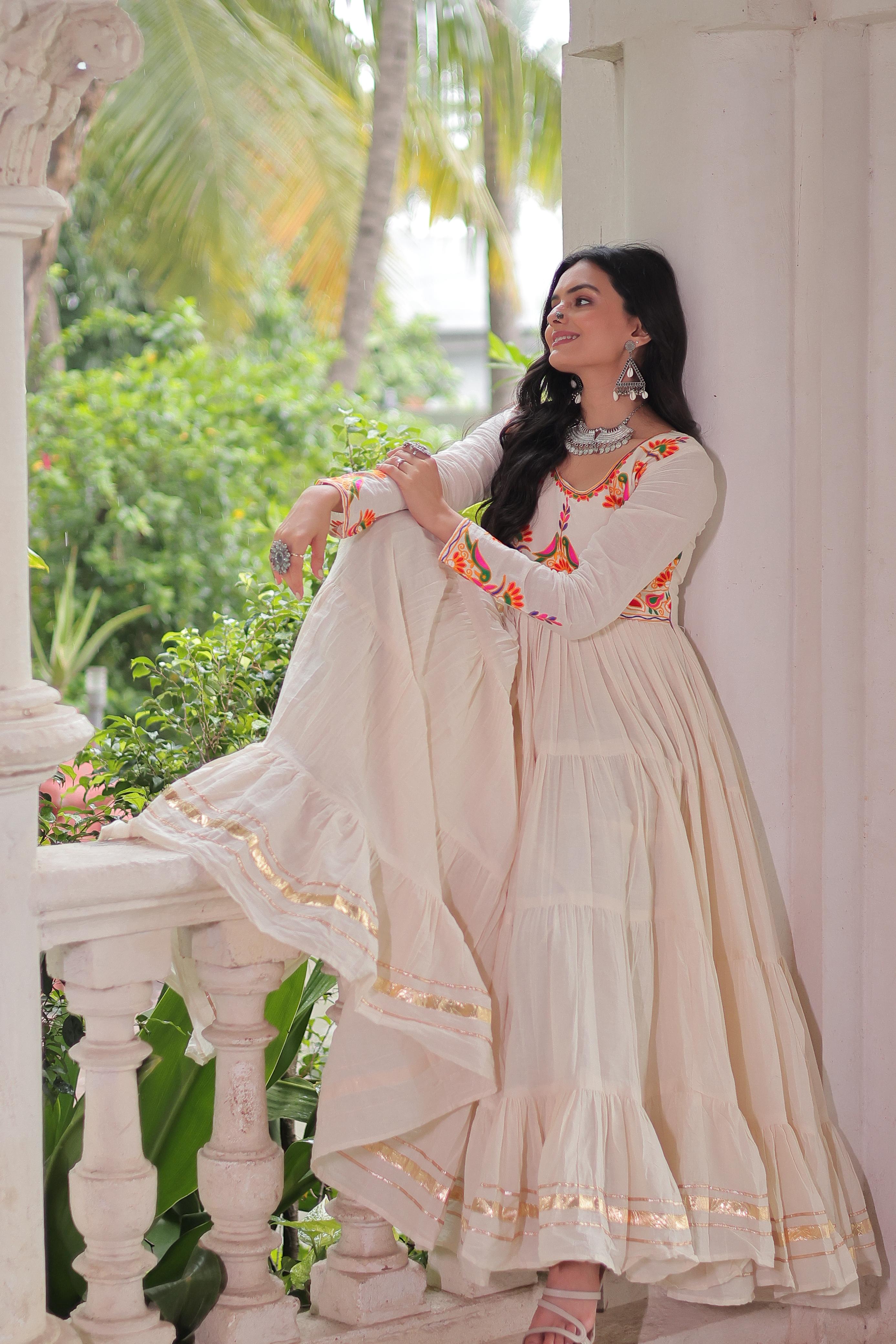 Cream Tiered Anarkali Gown with Vibrant Mirror Embroidery