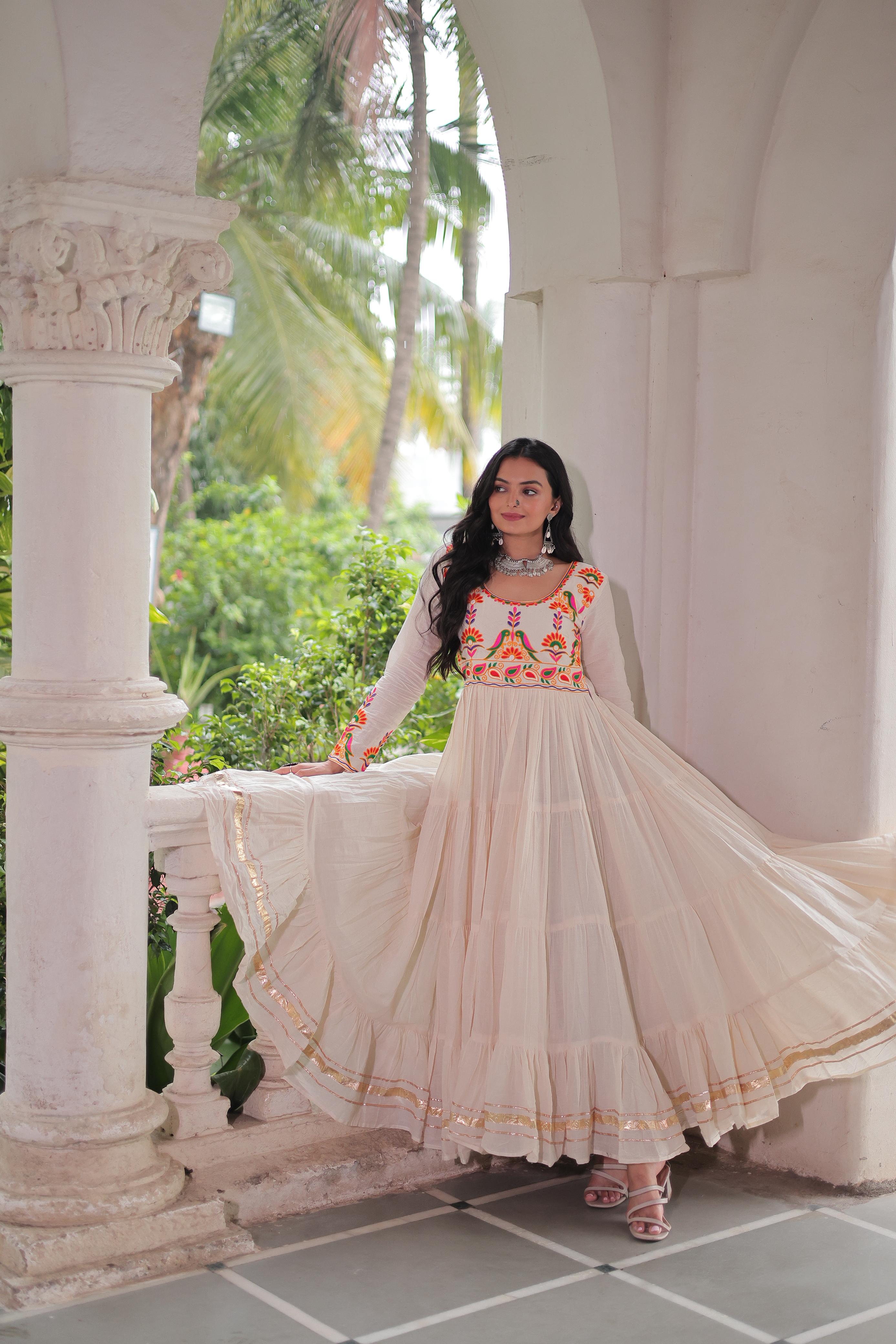 Cream Tiered Anarkali Gown with Vibrant Mirror Embroidery