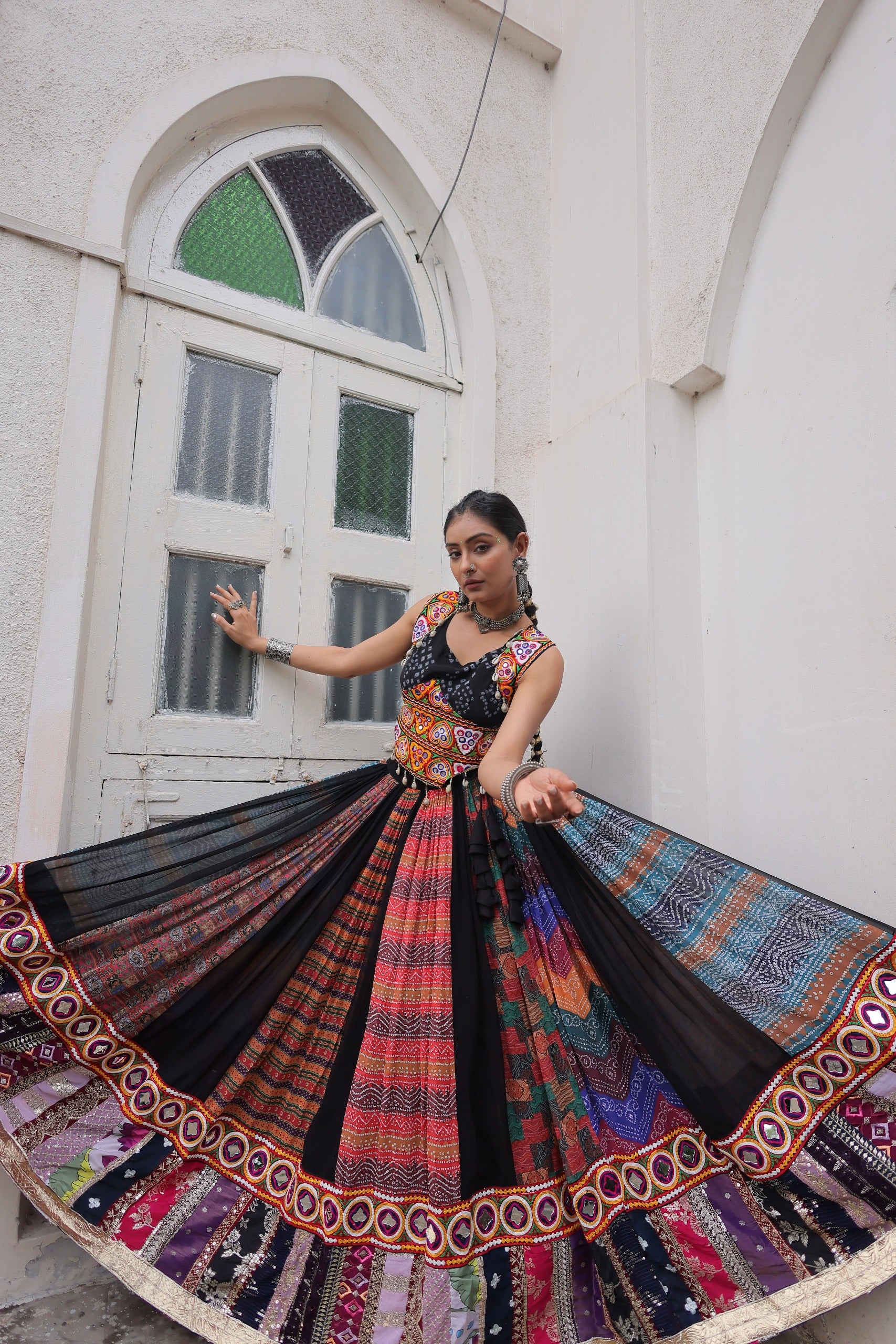 Black & Multi-Color Navratri Ghagra Choli with Embroidery and Traditional Patchwork  Description: