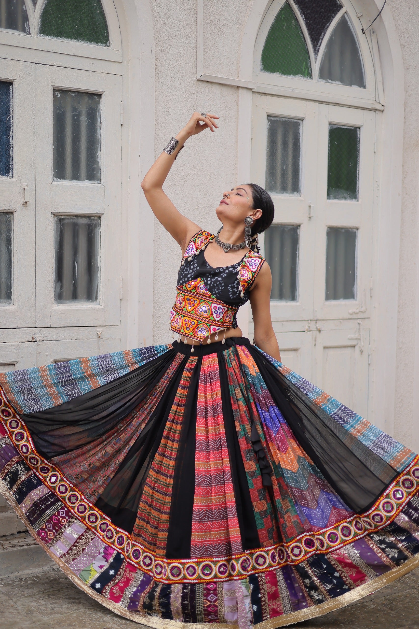Black & Multi-Color Navratri Ghagra Choli with Embroidery and Traditional Patchwork  Description: