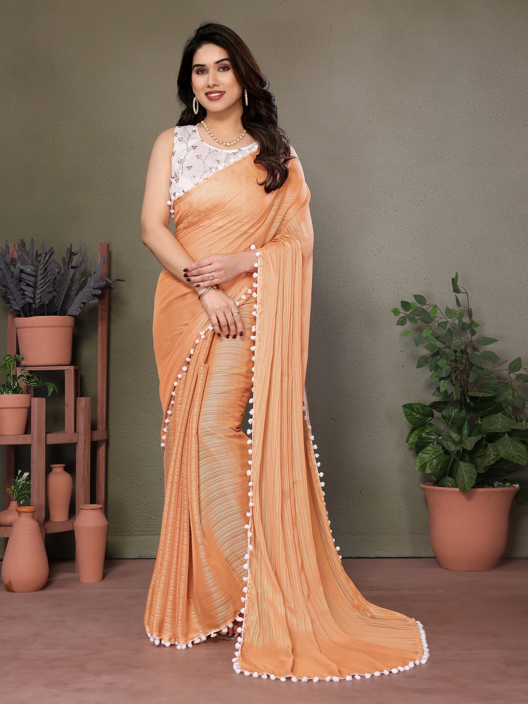 Peach Pleated Saree with Pom-Pom Lace & White Embroidered Blouse