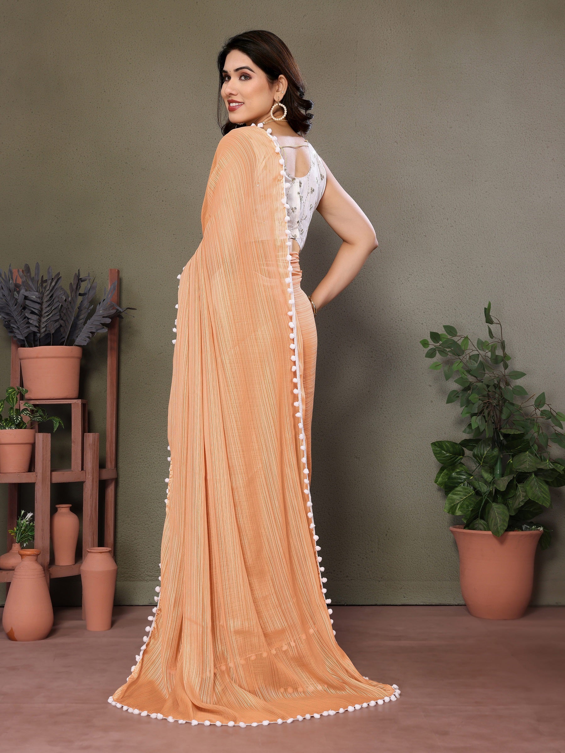 Peach Pleated Saree with Pom-Pom Lace & White Embroidered Blouse