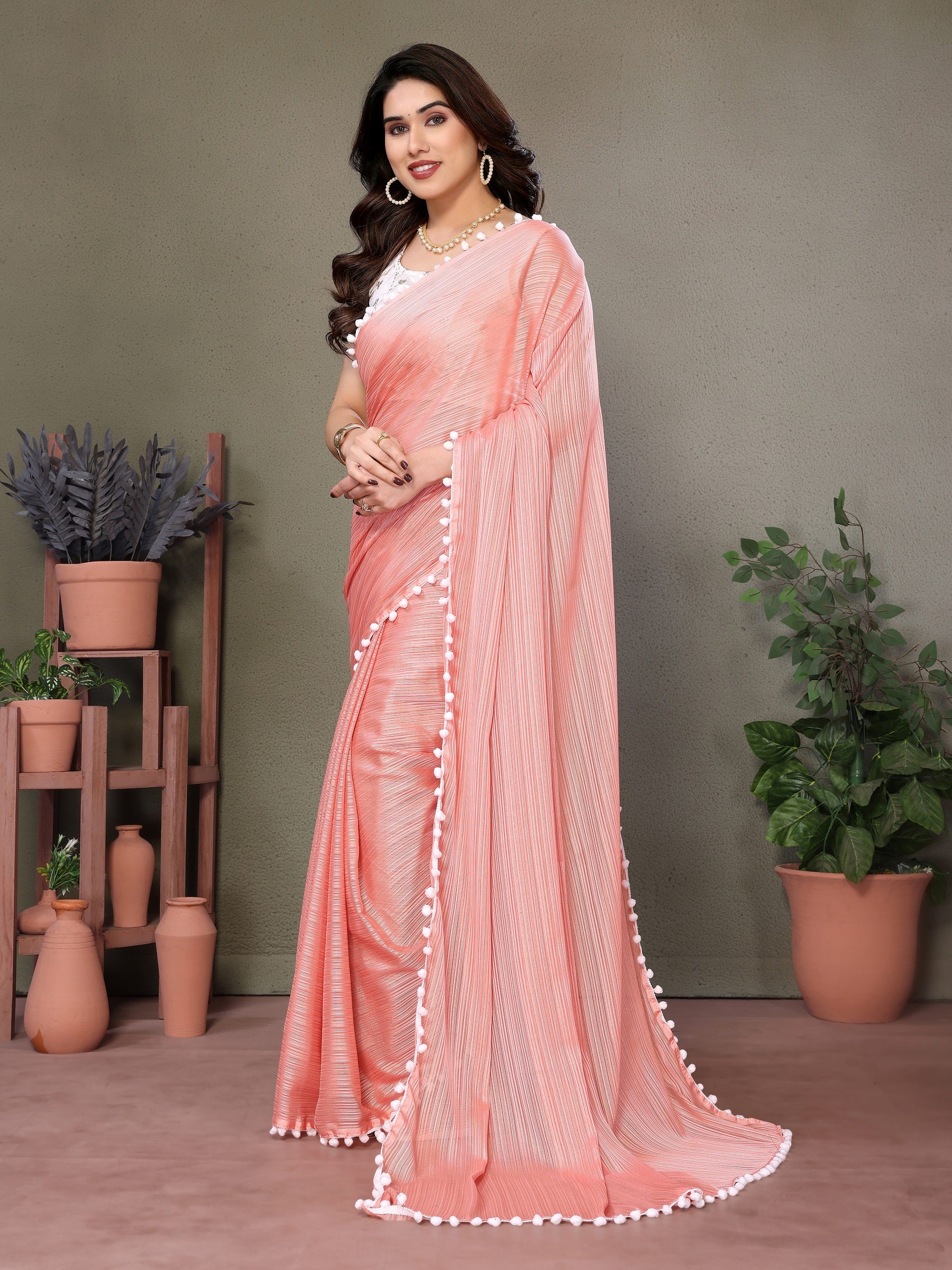 Elegant Peach Pleated Saree with Pom-Pom Border