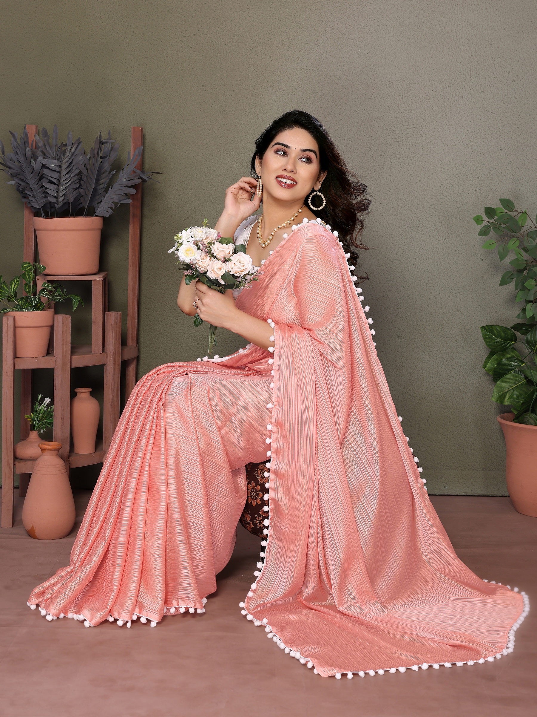 Elegant Peach Pleated Saree with Pom-Pom Border