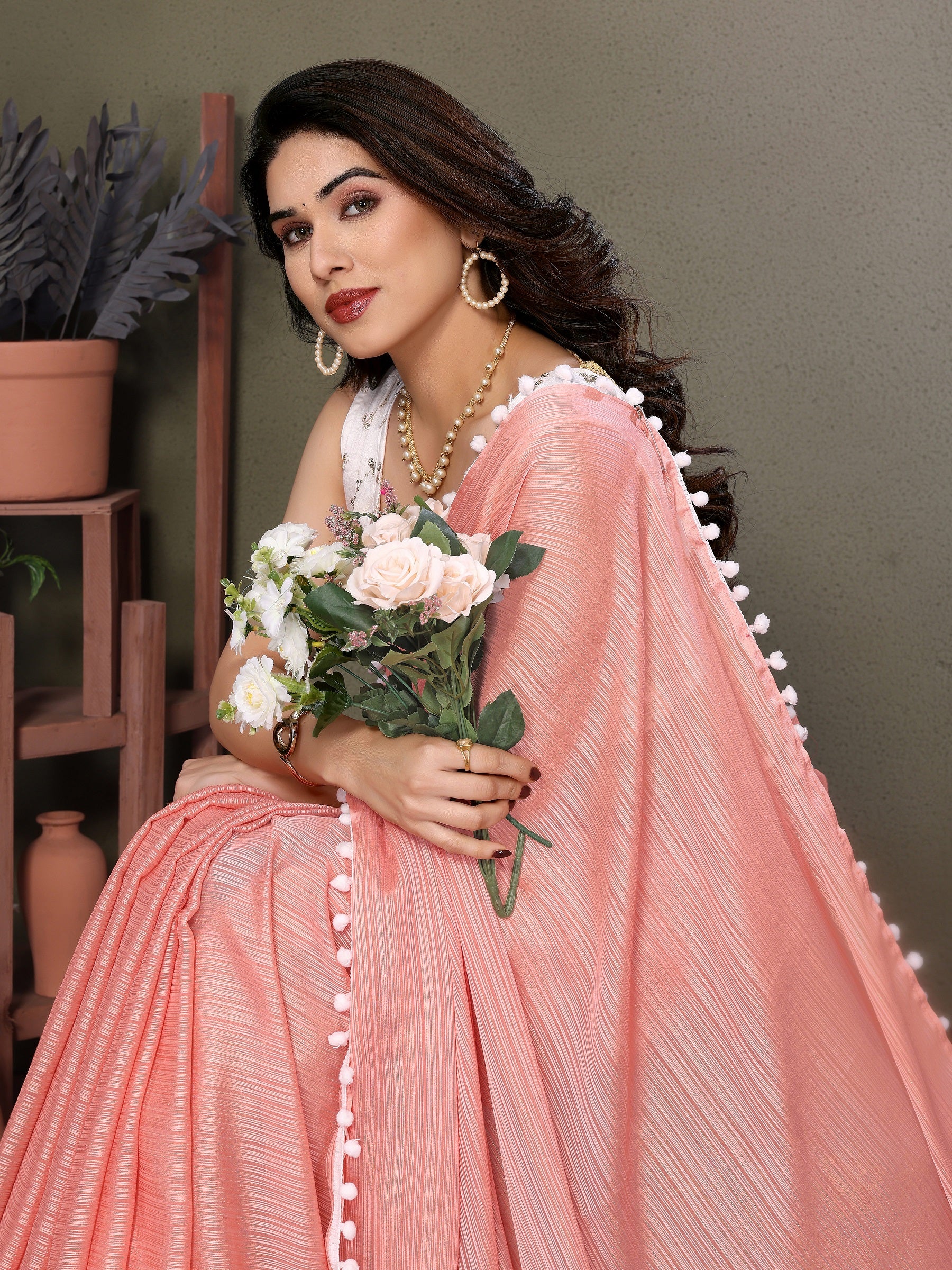 Elegant Peach Pleated Saree with Pom-Pom Border