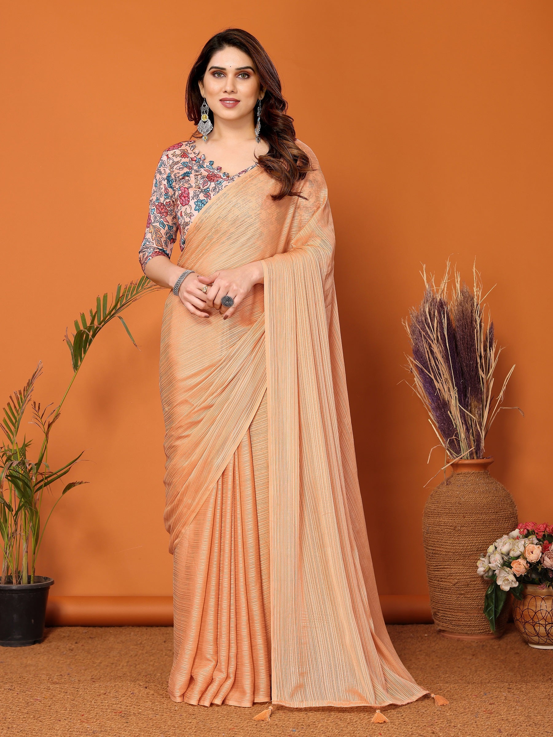 Elegant Peach Textured Saree with Floral Embroidered Blouse