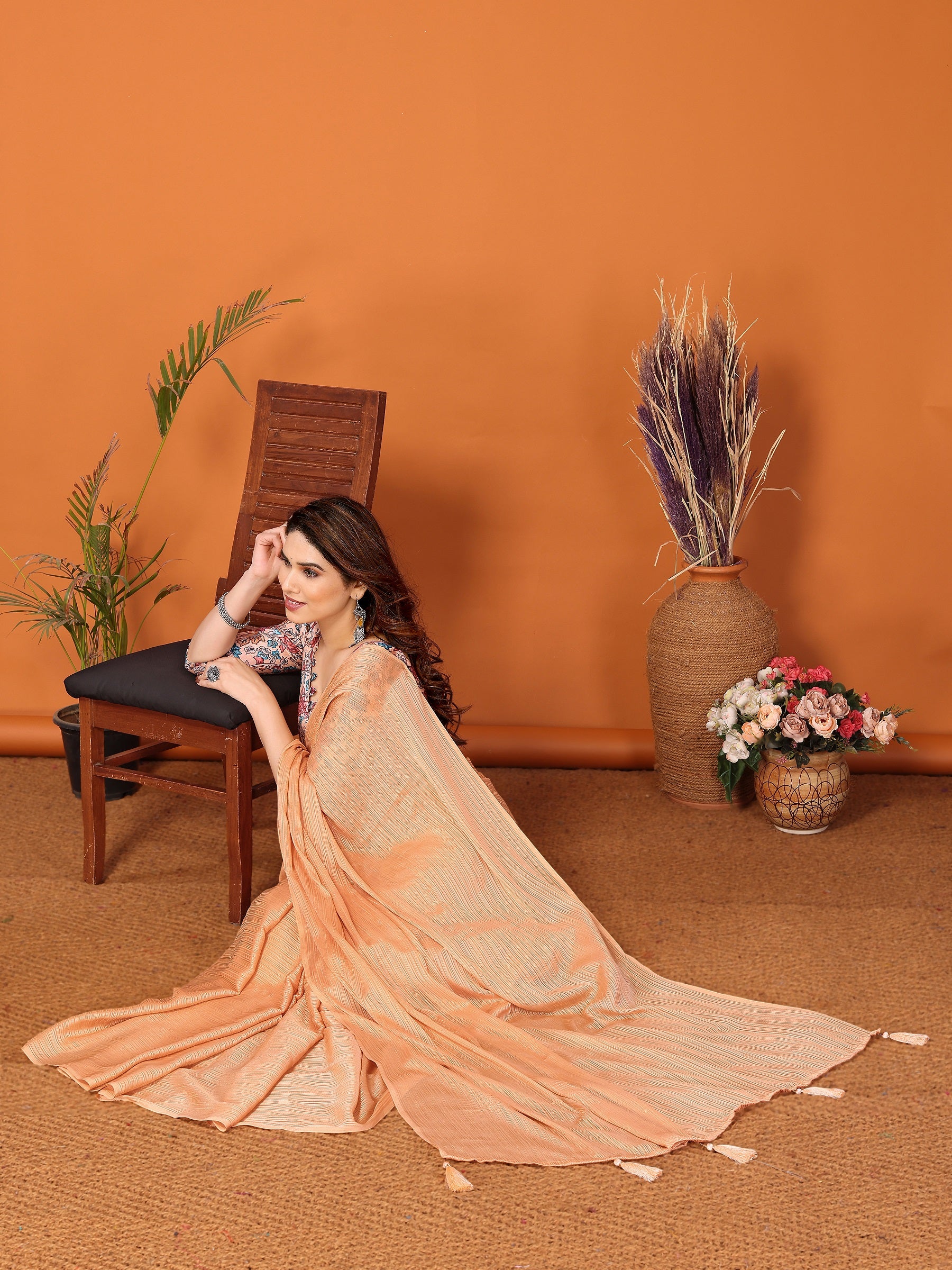 Elegant Peach Textured Saree with Floral Embroidered Blouse