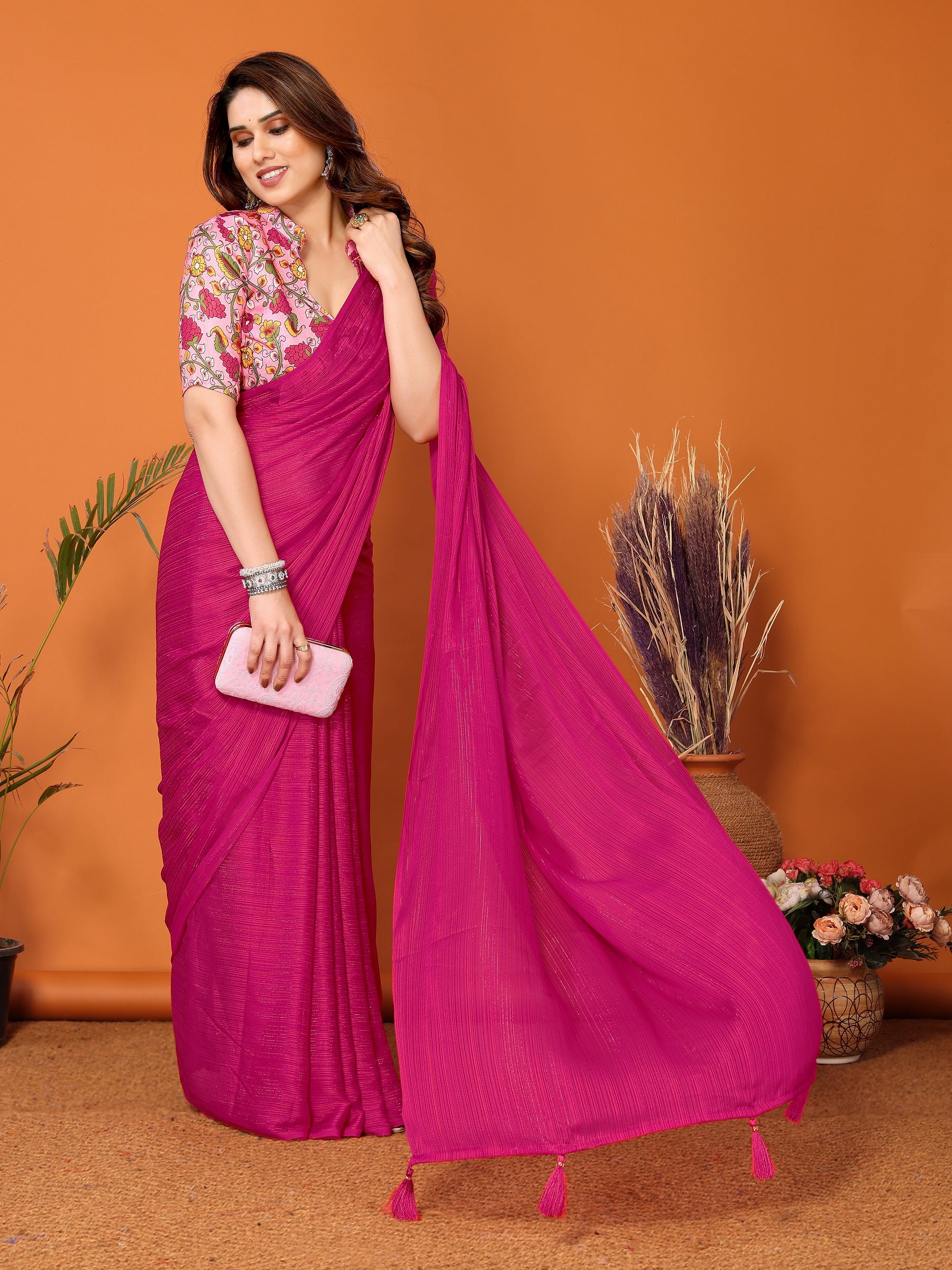 Vibrant Magenta Textured Saree with Colorful Embroidered Blouse