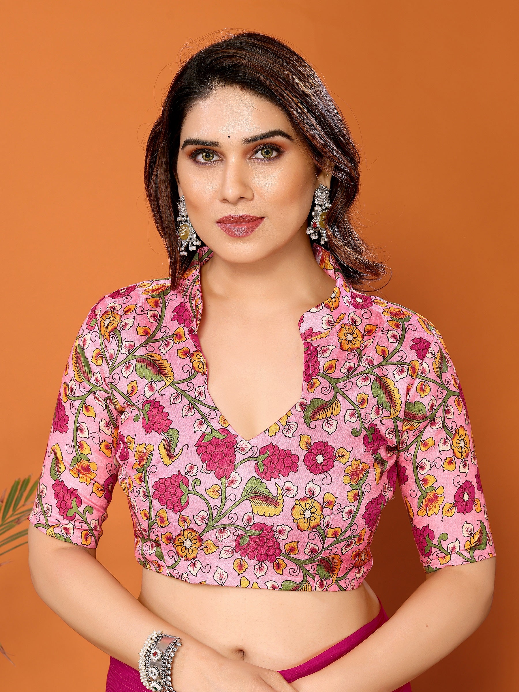 Vibrant Magenta Textured Saree with Colorful Embroidered Blouse