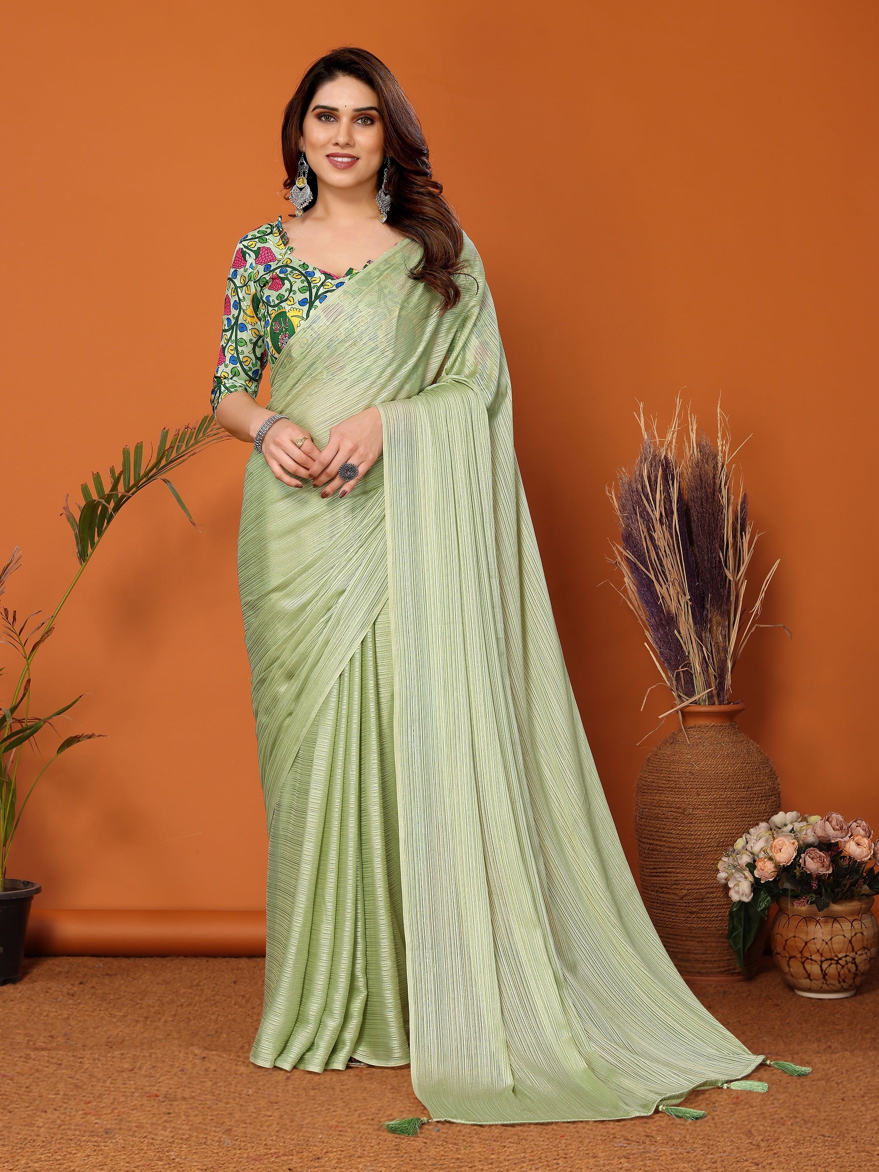 Pista Green Textured Saree with Vibrant Embroidered Blouse