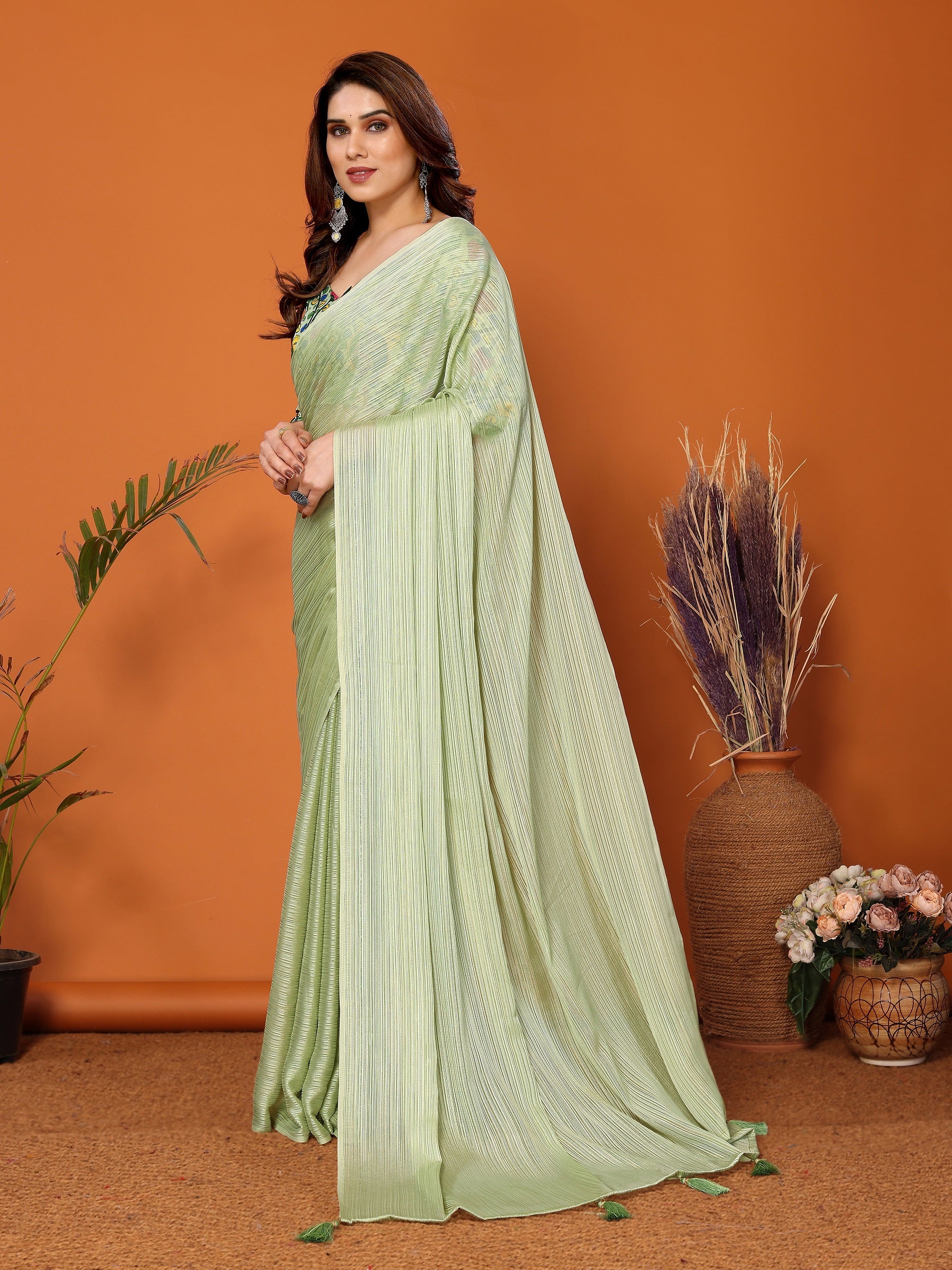 Pista Green Textured Saree with Vibrant Embroidered Blouse