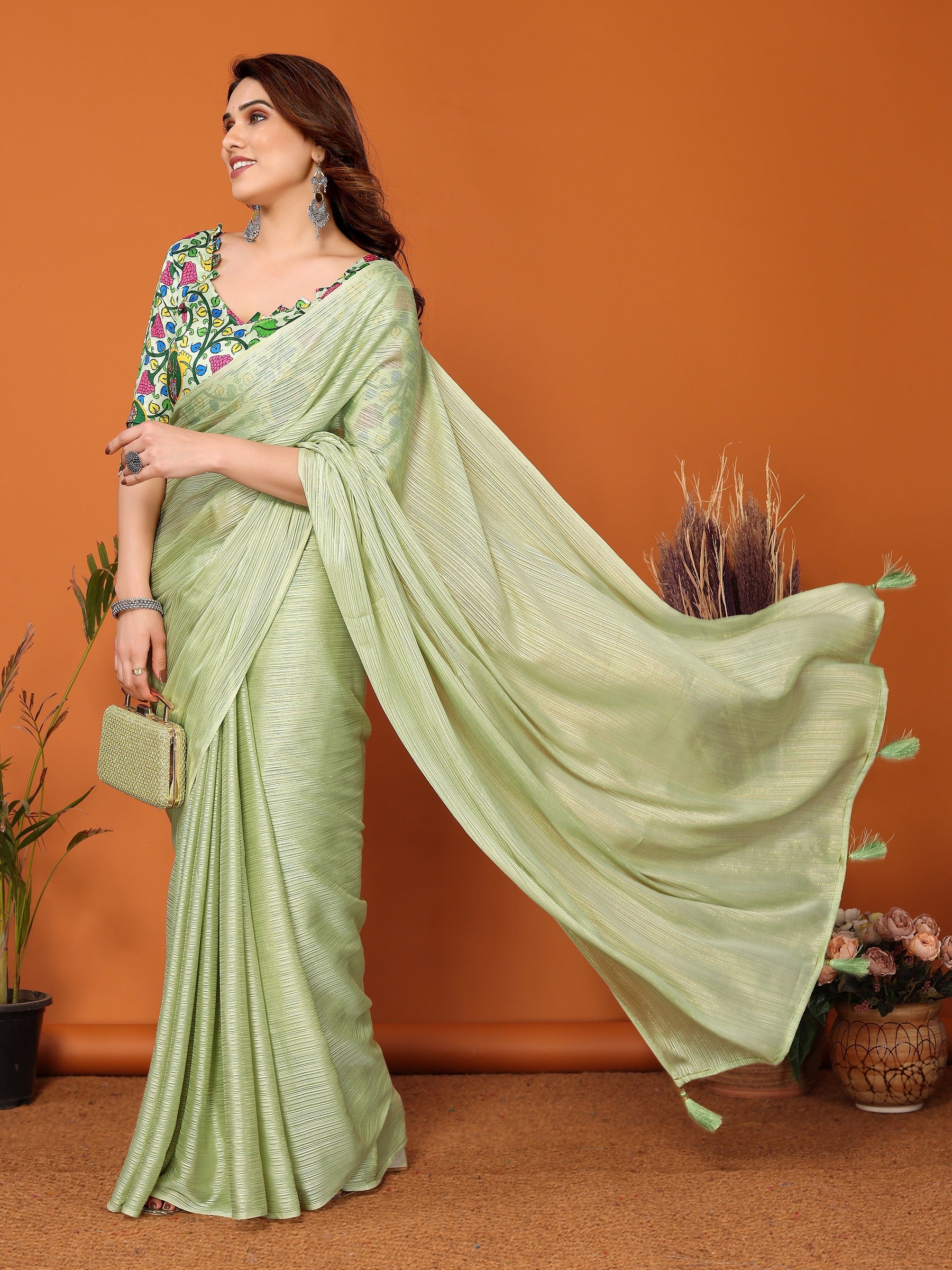 Pista Green Textured Saree with Vibrant Embroidered Blouse