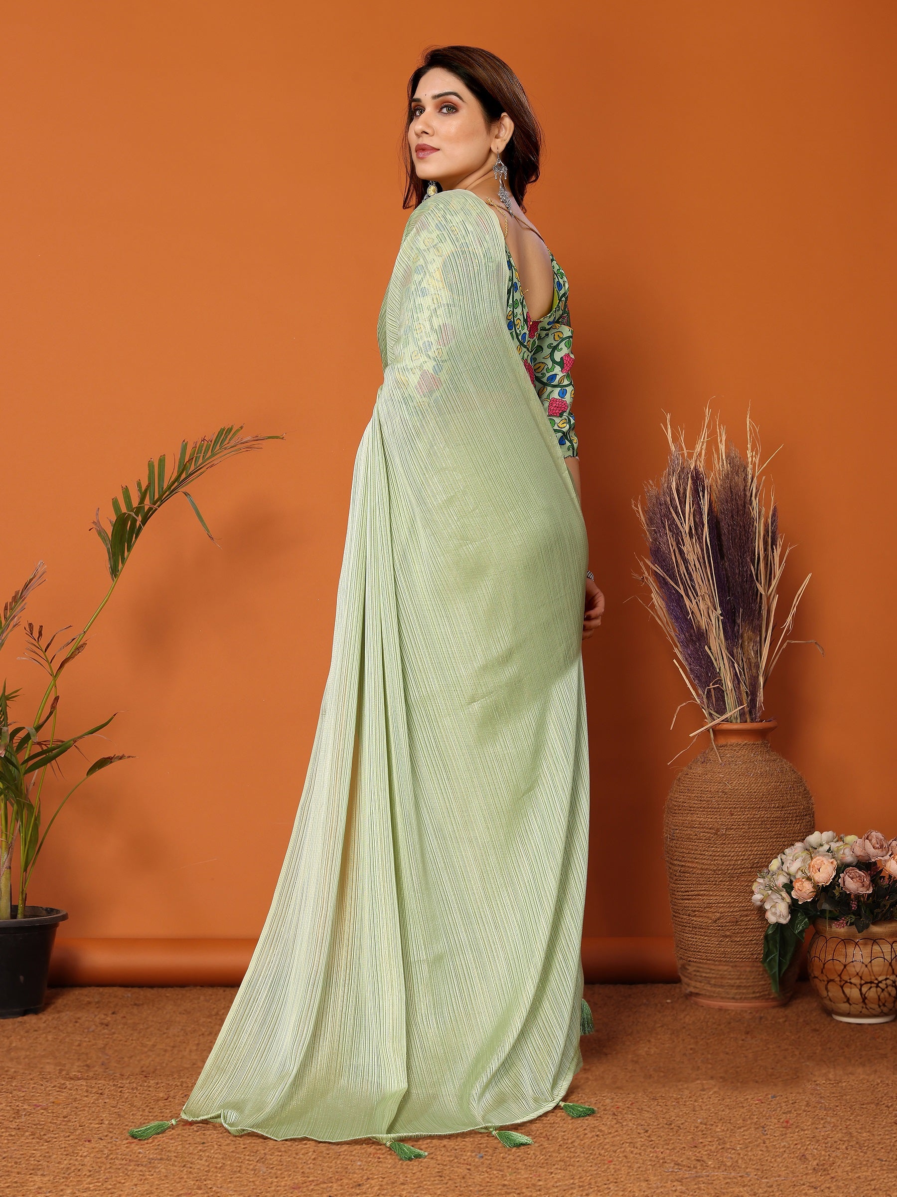 Pista Green Textured Saree with Vibrant Embroidered Blouse