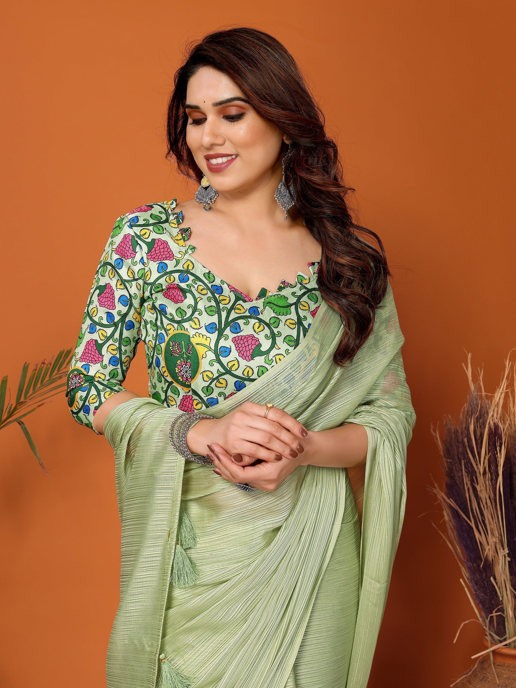Pista Green Textured Saree with Vibrant Embroidered Blouse