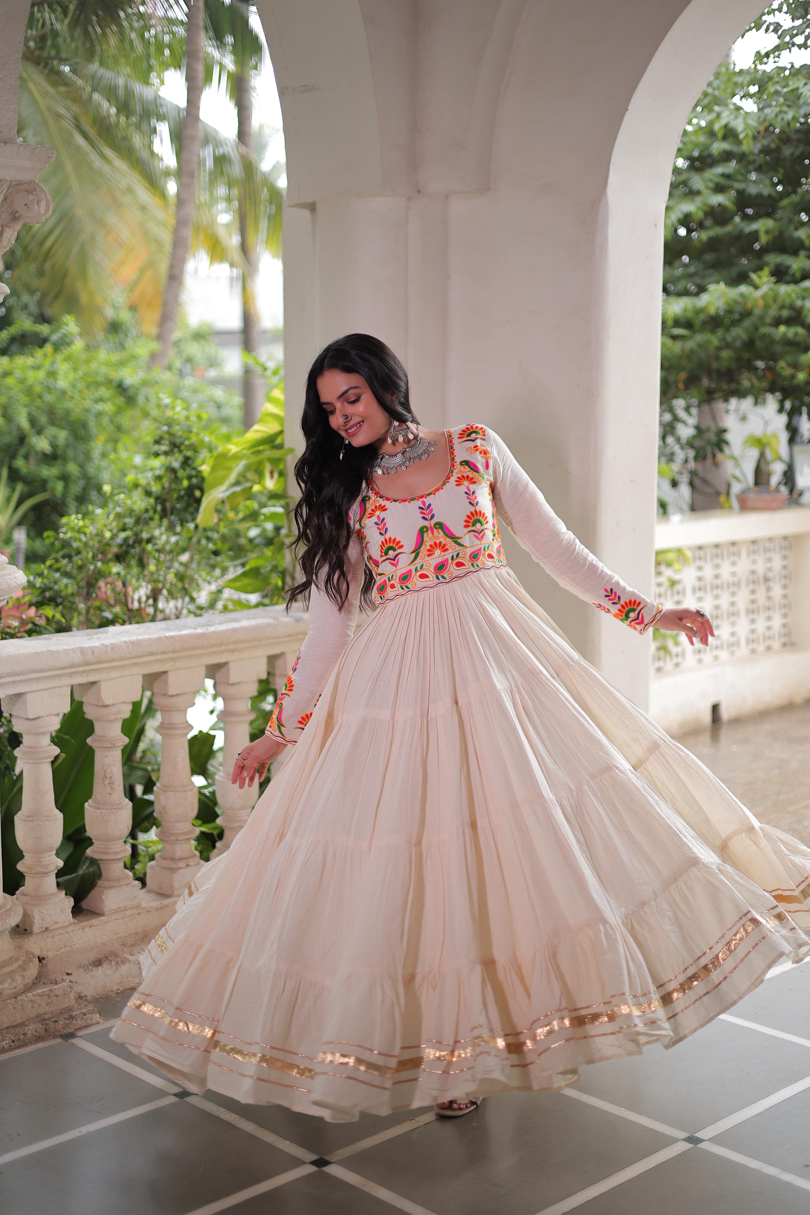 Cream Tiered Anarkali Gown with Vibrant Mirror Embroidery