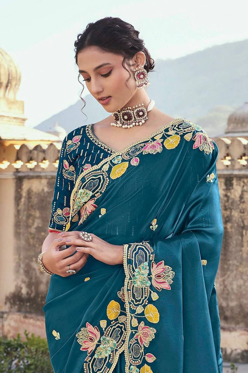 Elegant Teal Blue Embroidered Georgette Saree with Designer Blouse