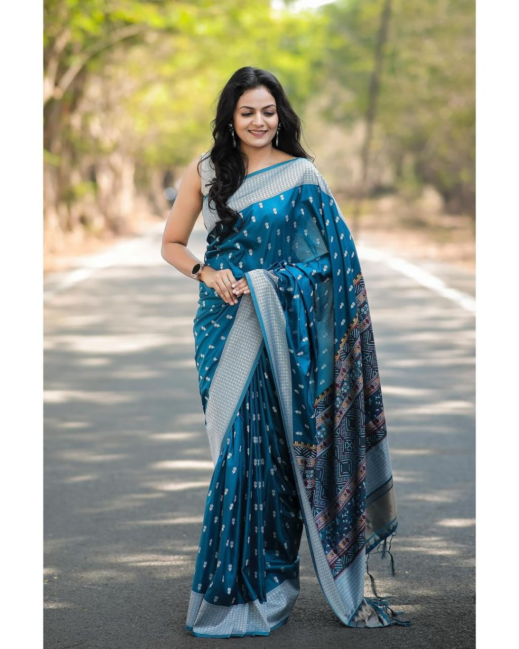 Teal Blue Woven Symphony Saree