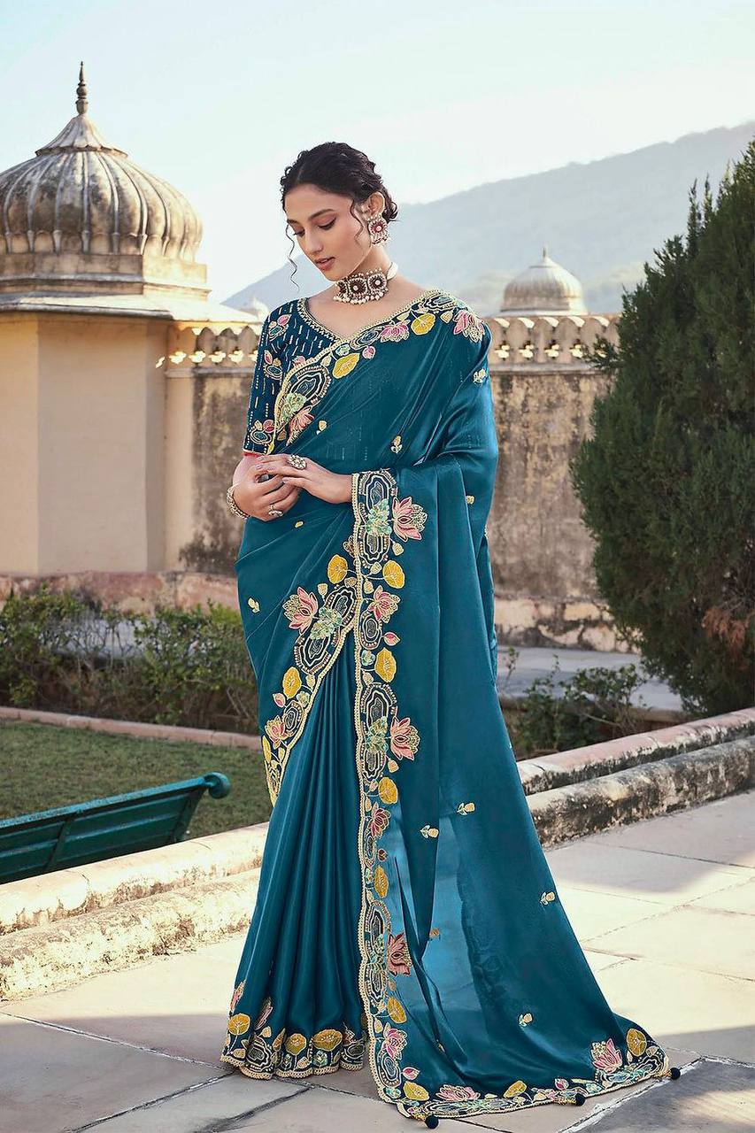 Elegant Teal Blue Embroidered Georgette Saree with Designer Blouse