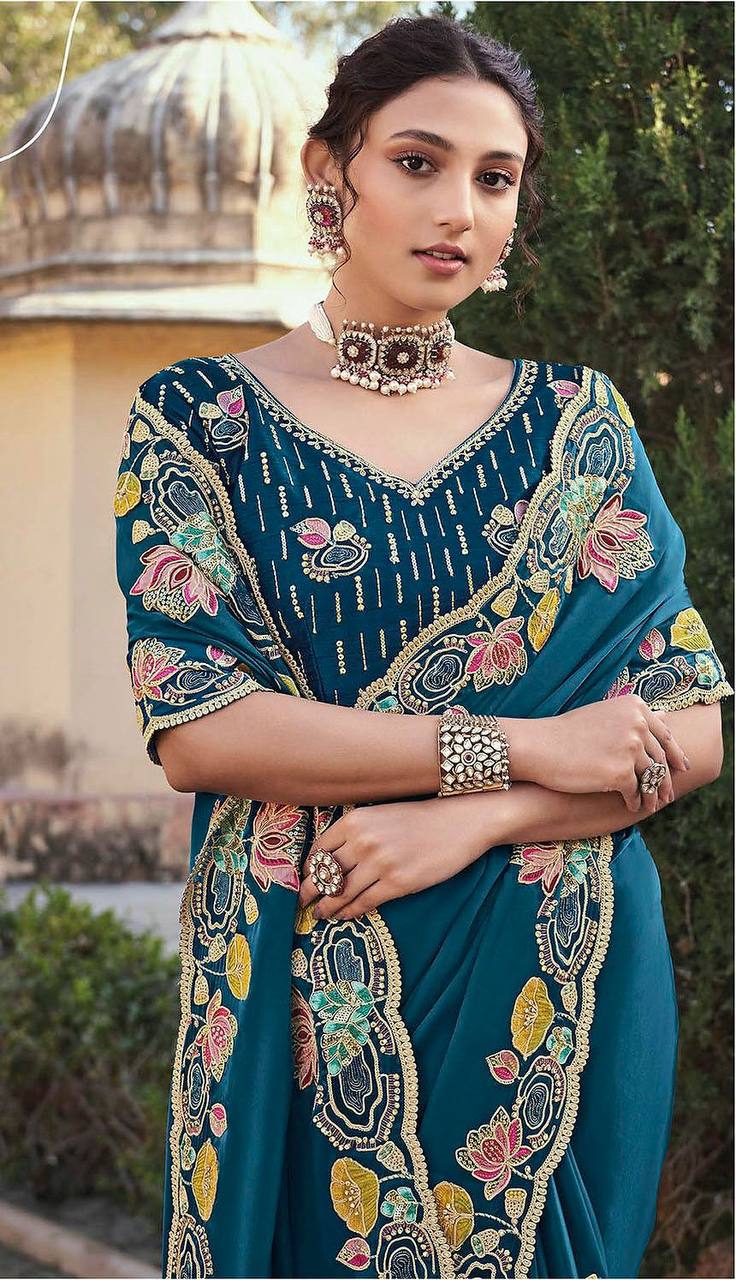 Elegant Teal Blue Embroidered Georgette Saree with Designer Blouse